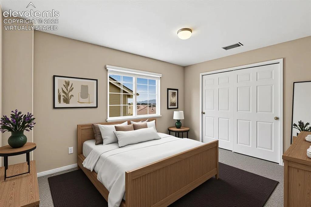 Image 29 of 40: virtually staged bedroom 4