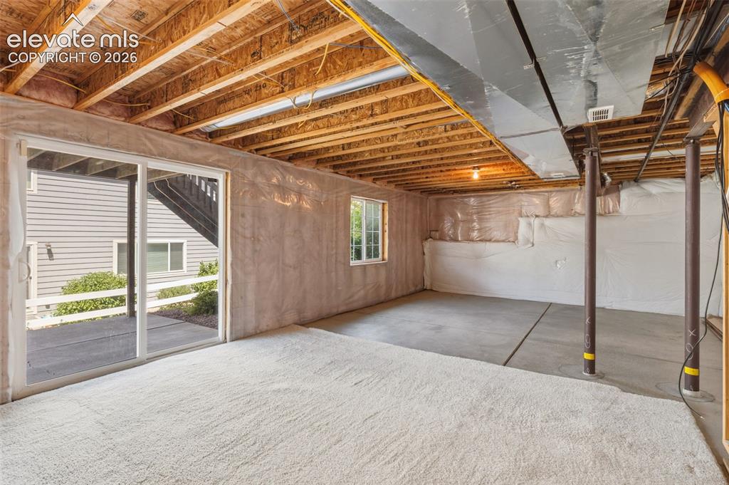 Image 34 of 40: Walk out basement to patio