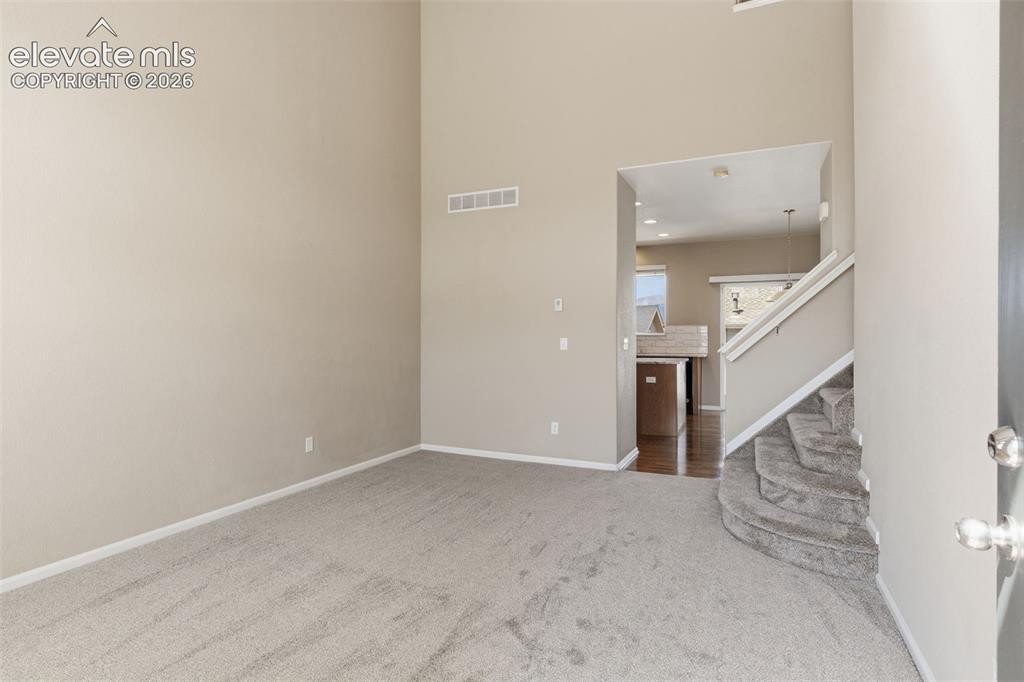 Image 4 of 40: New carpet throughout the house