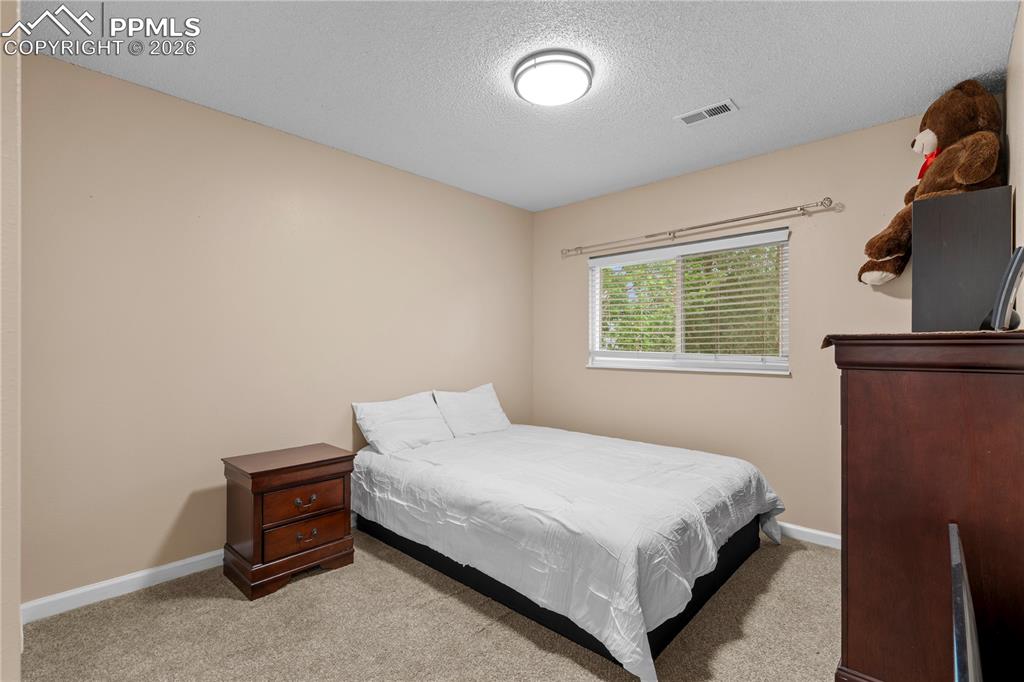 Image 26 of 35: 2nd bedroom