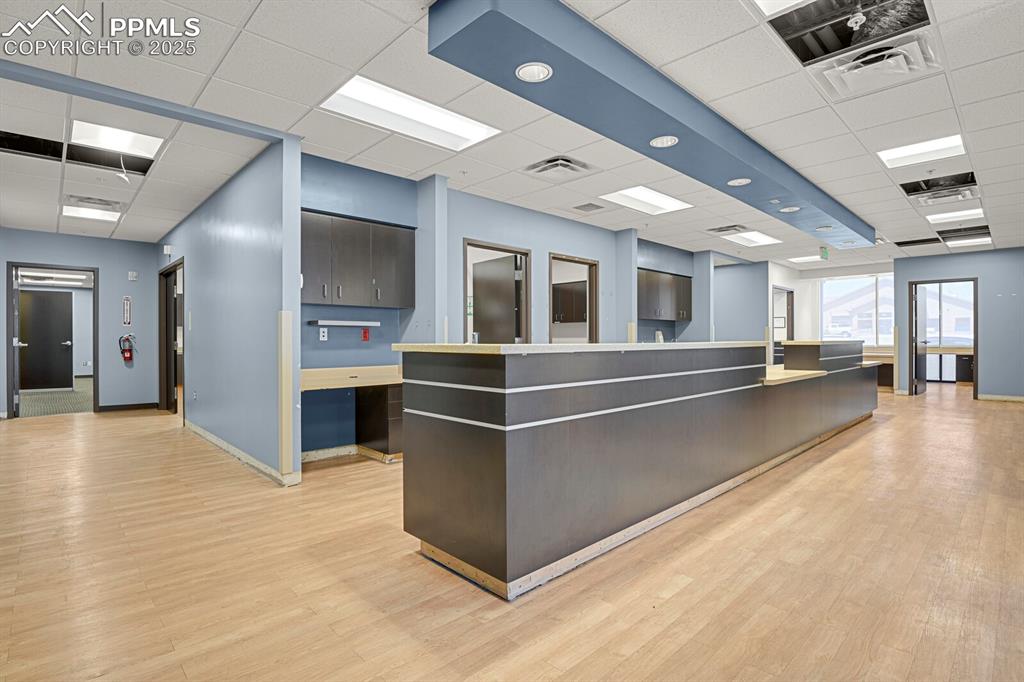 Image 19 of 43: Welcome area featuring a paneled ceiling