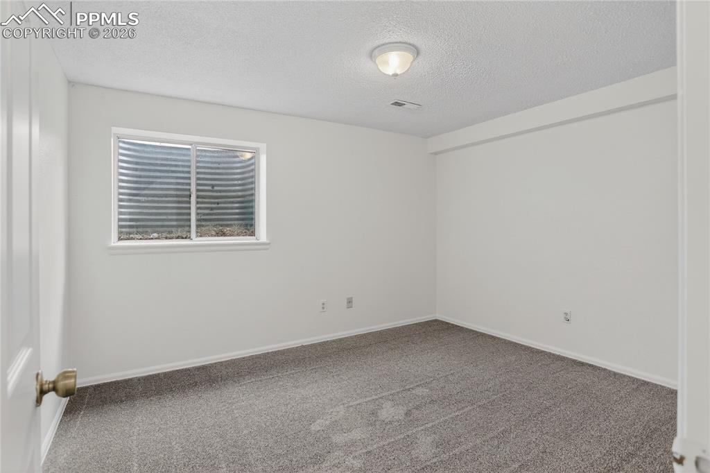 Image 14 of 17: Bedroom 4 - lower level