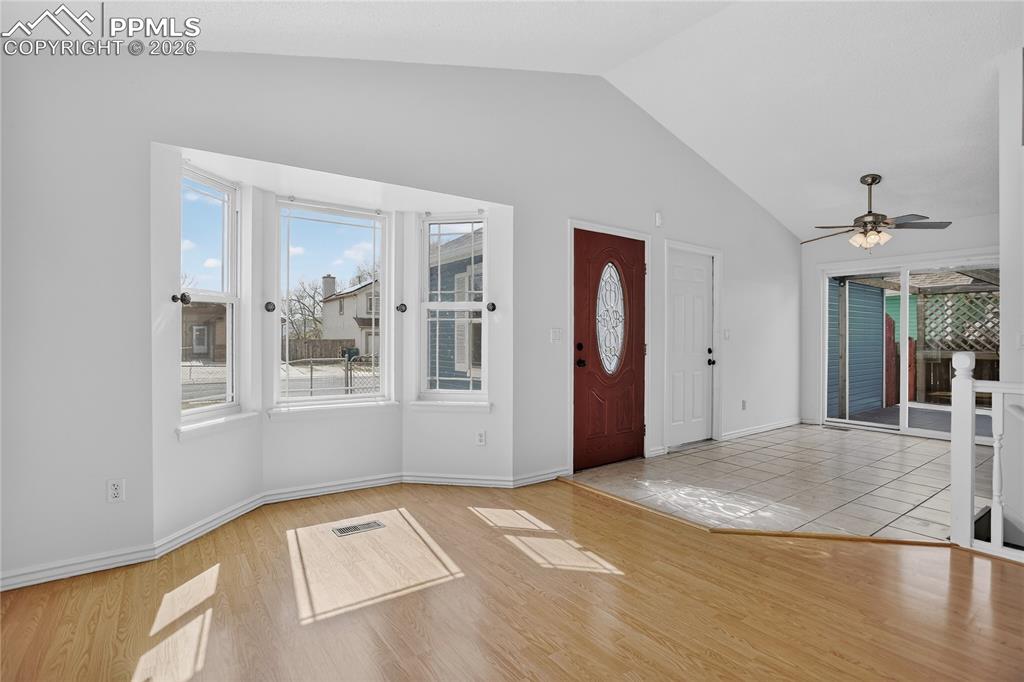 Image 2 of 17: Bay window & vaulted ceiling