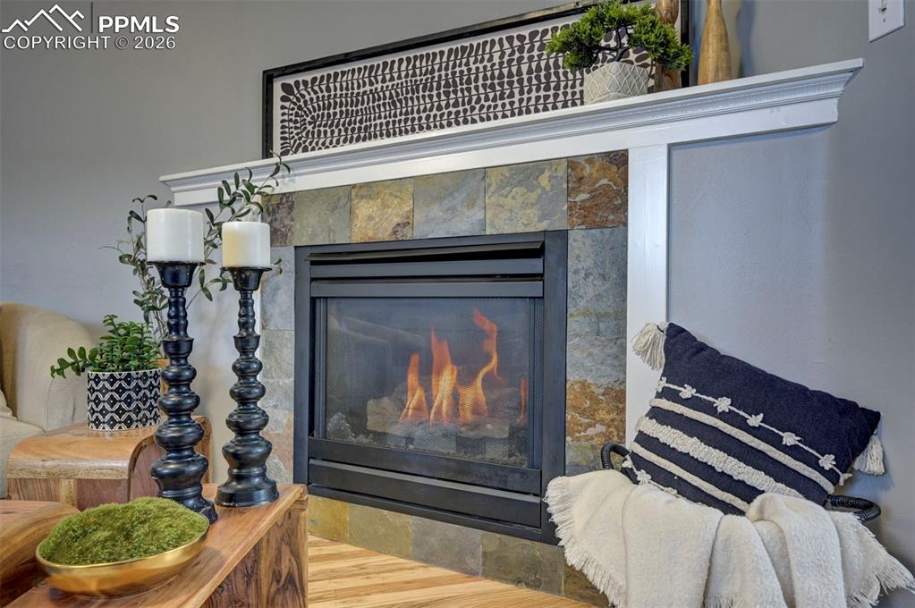 Image 4 of 32: Gas Fireplace w/ Tile surround