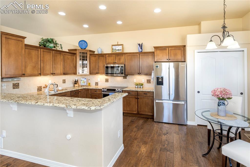 Image 26 of 50: Bosch 26 Cu Ft French Door refrigerator and double pantry with custom shelv