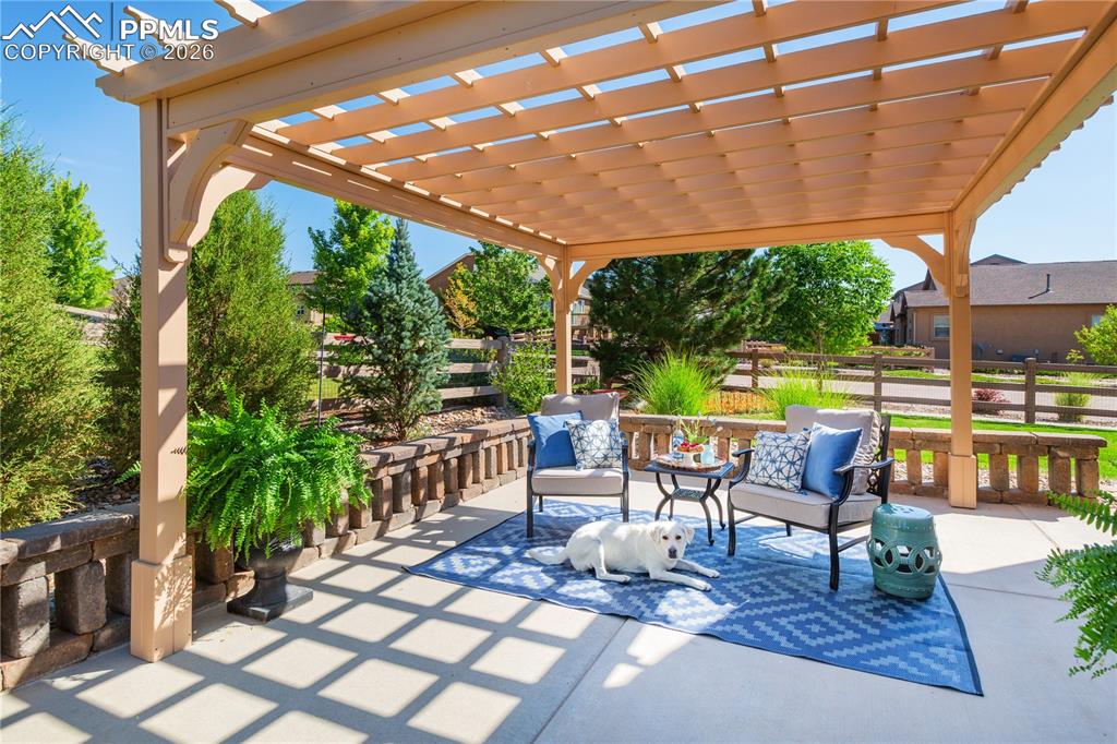 Image 48 of 50: Ready to enjoy this summer with an enclosed backyard, custom pergola, expan