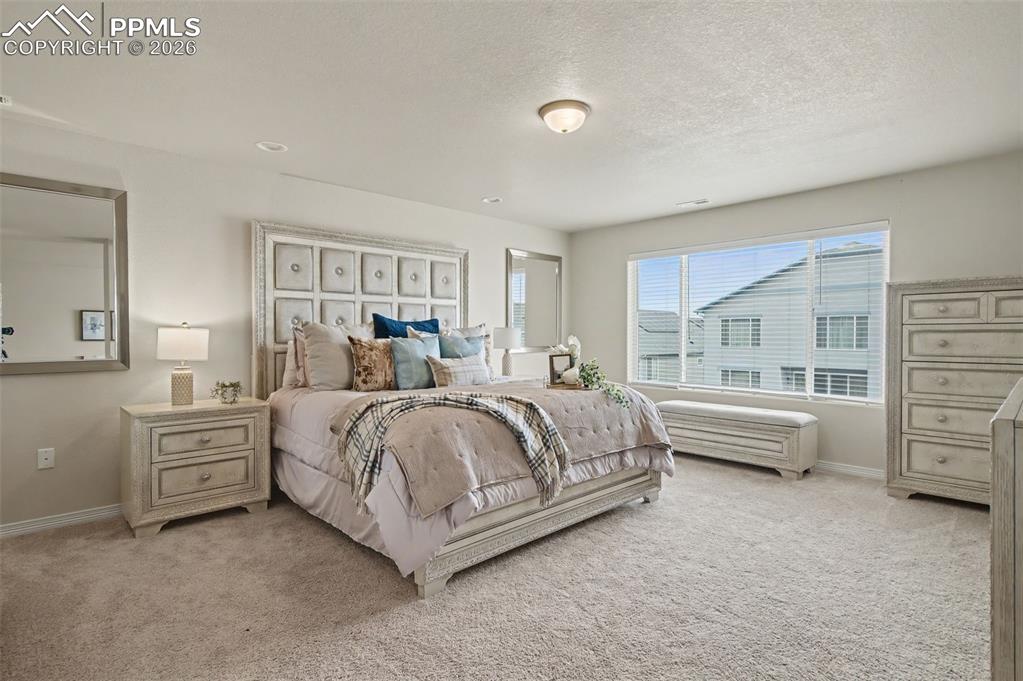 Image 18 of 38: Bedroom