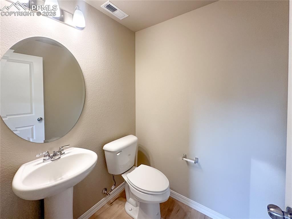 Image 14 of 36: Main level powder bath