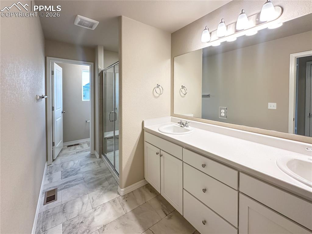 Image 23 of 36: Master Bathroom