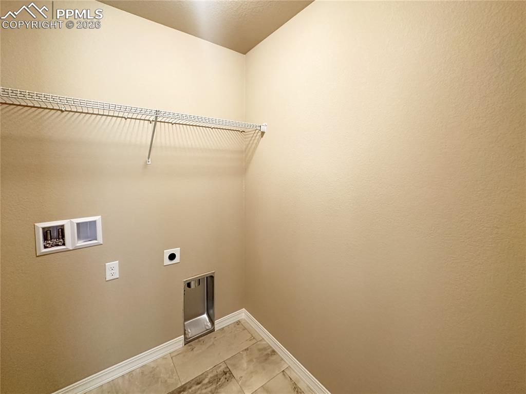 Image 32 of 36: Upstairs laundry 