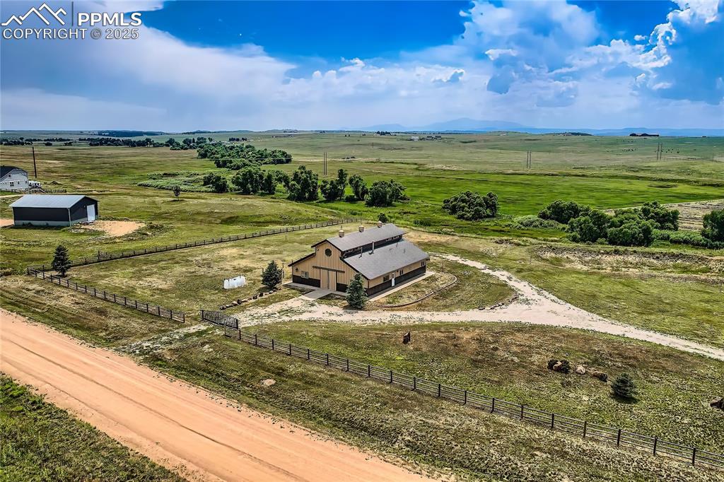 Image 31 of 50: Front Drive Approach – The gated entry and circular drive lead to barn, per