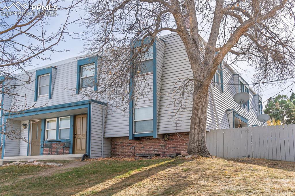 Caption: View of front facade featuring a porch