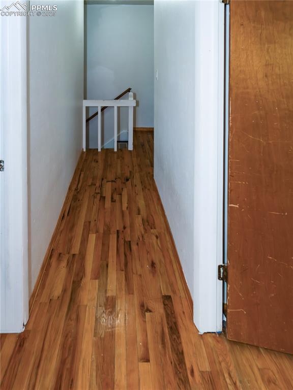 Image 20 of 23: Hallway featuring wood finished floors