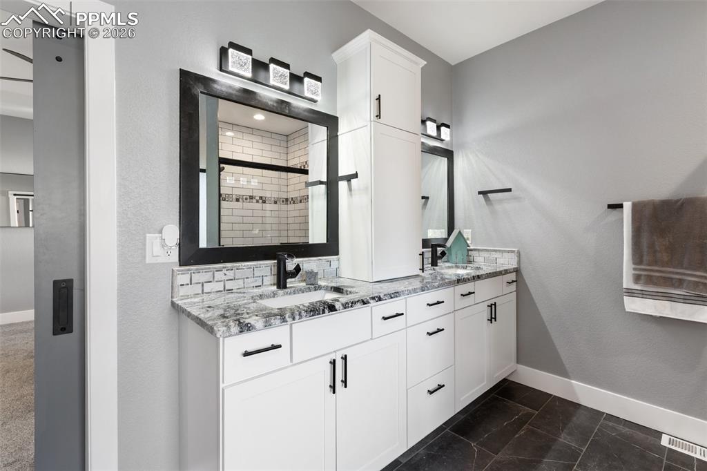 Image 27 of 50: Master Bathroom