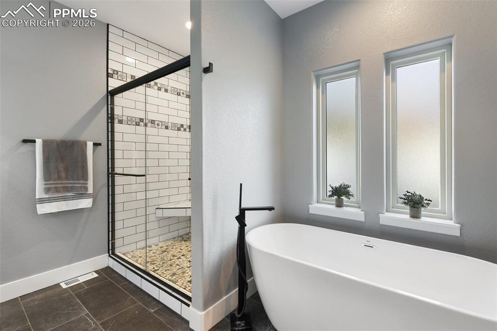 Image 28 of 50: Master Bathroom