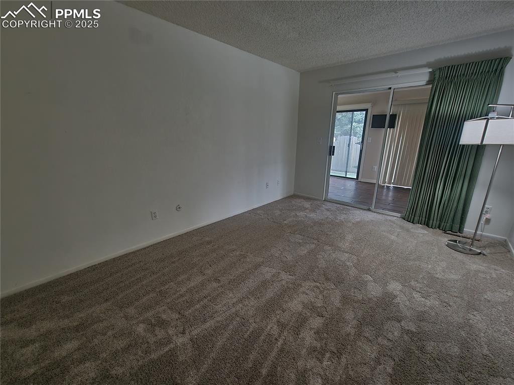 Image 16 of 32: Bedroom 2 with new carpet. 
