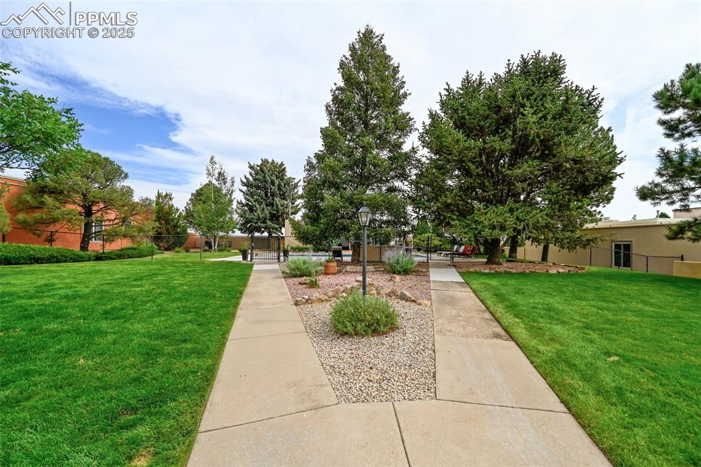 Image 25 of 32: The community area with green space.