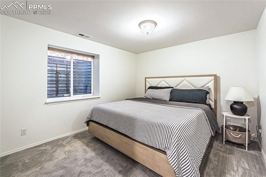 Image 40 of 50: Bedroom