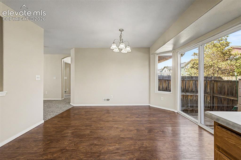 Image 12 of 32: Large open kitchen/dining area