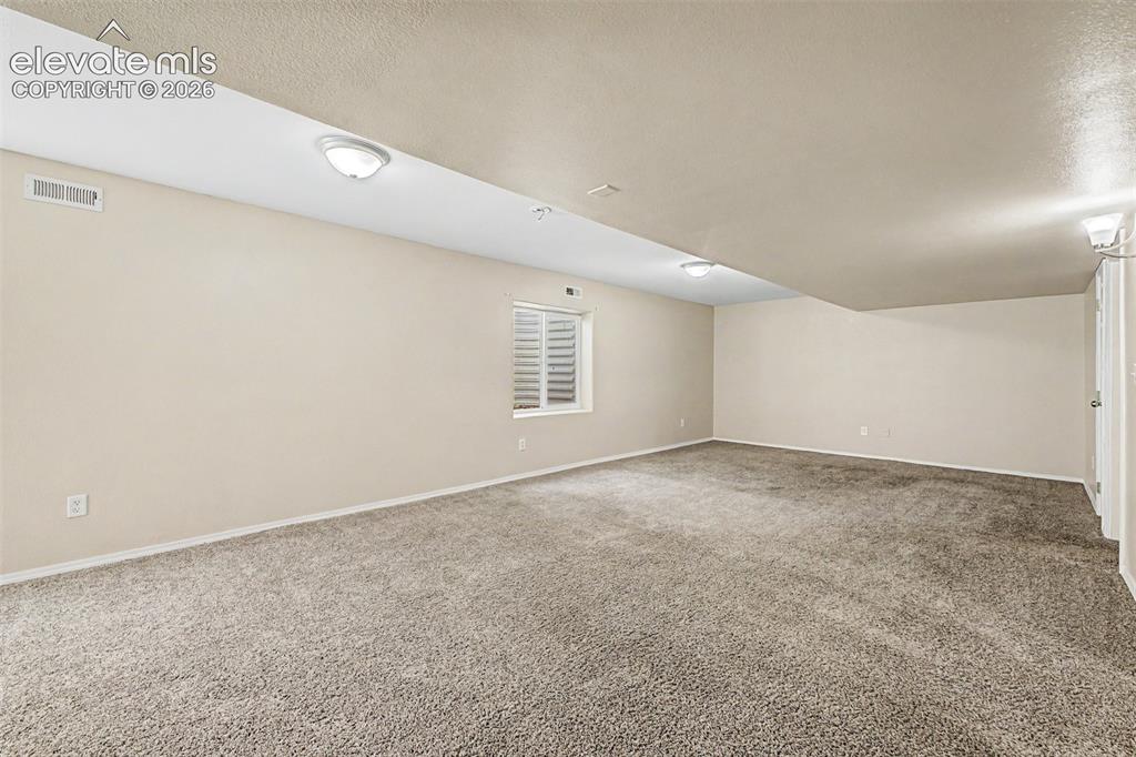 Image 23 of 32: Huge basement family room