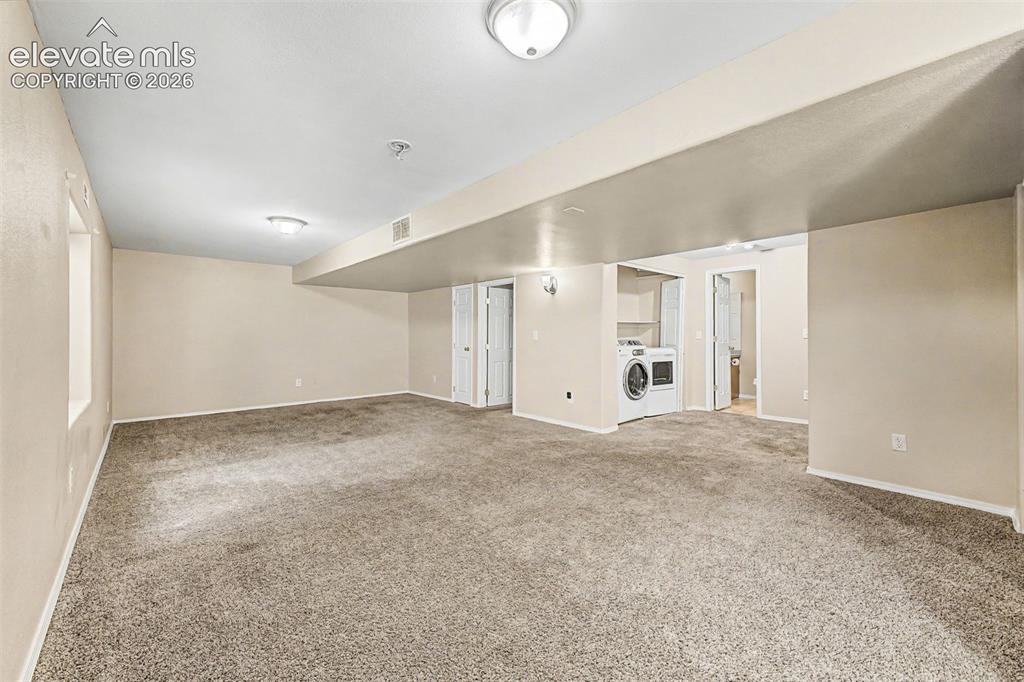 Image 24 of 32: Basement family room/flex space