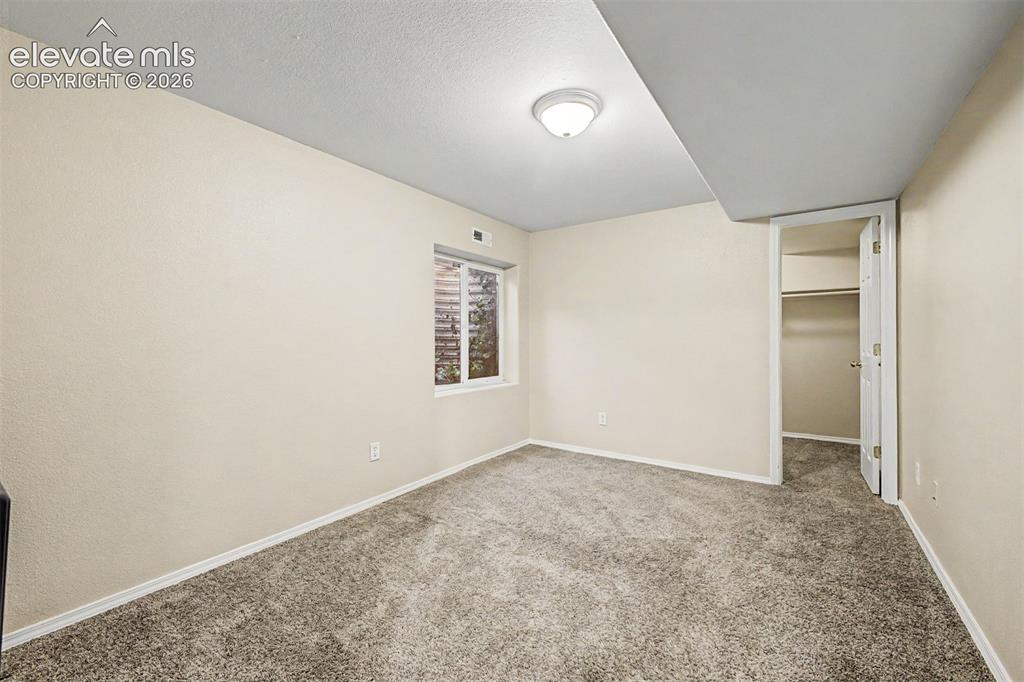 Image 29 of 32: Second basement bedroom