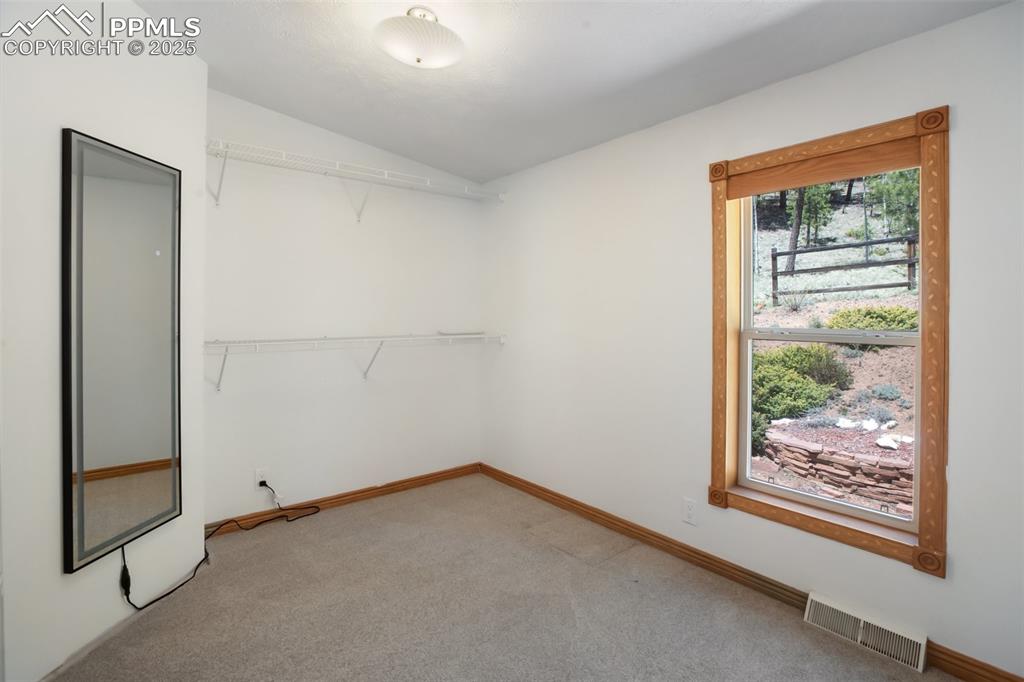 Image 19 of 27: Primary Closet - Huge!