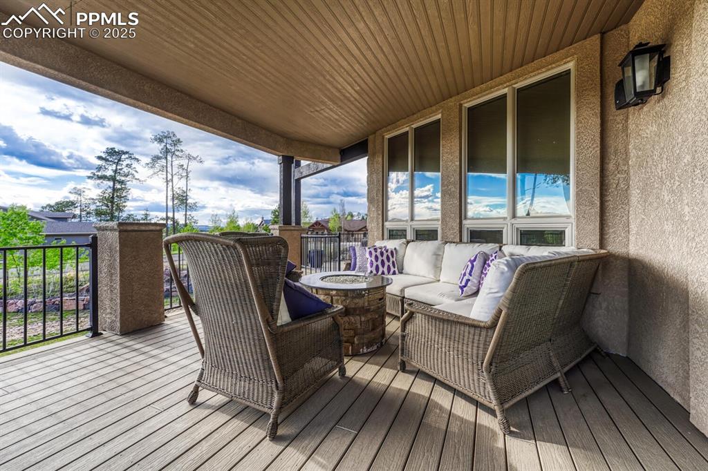 Image 45 of 50: Deck featuring outdoor lounge area