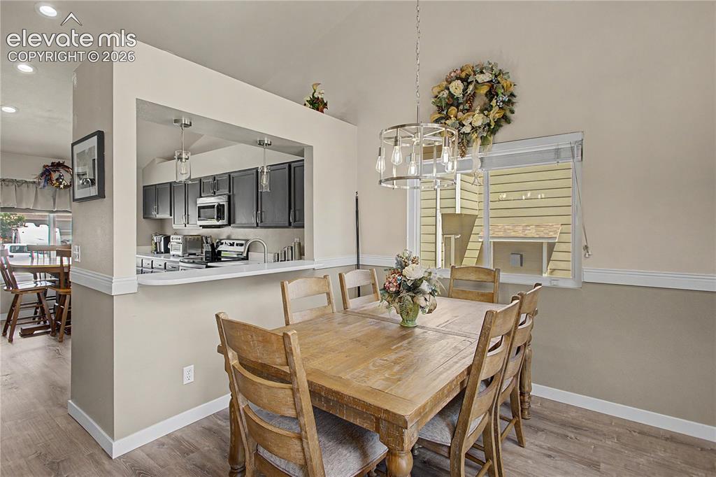 Image 10 of 40: Breakfast bar & additional dining