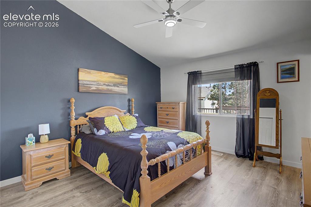 Image 14 of 40: Master with vaulted ceilings