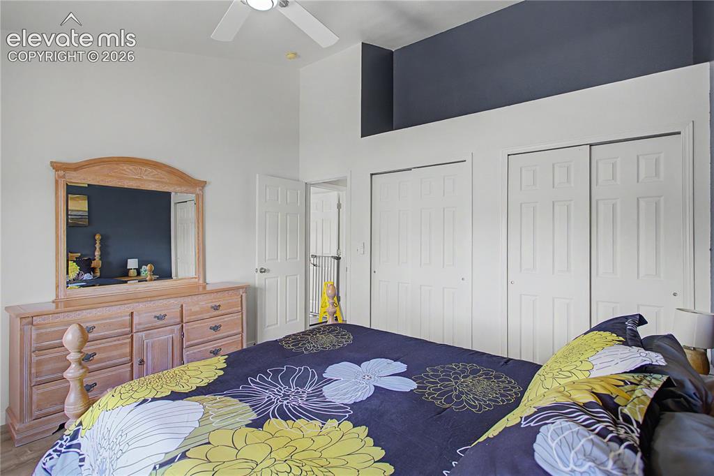 Image 15 of 40: Another view of master with ceiling fan
