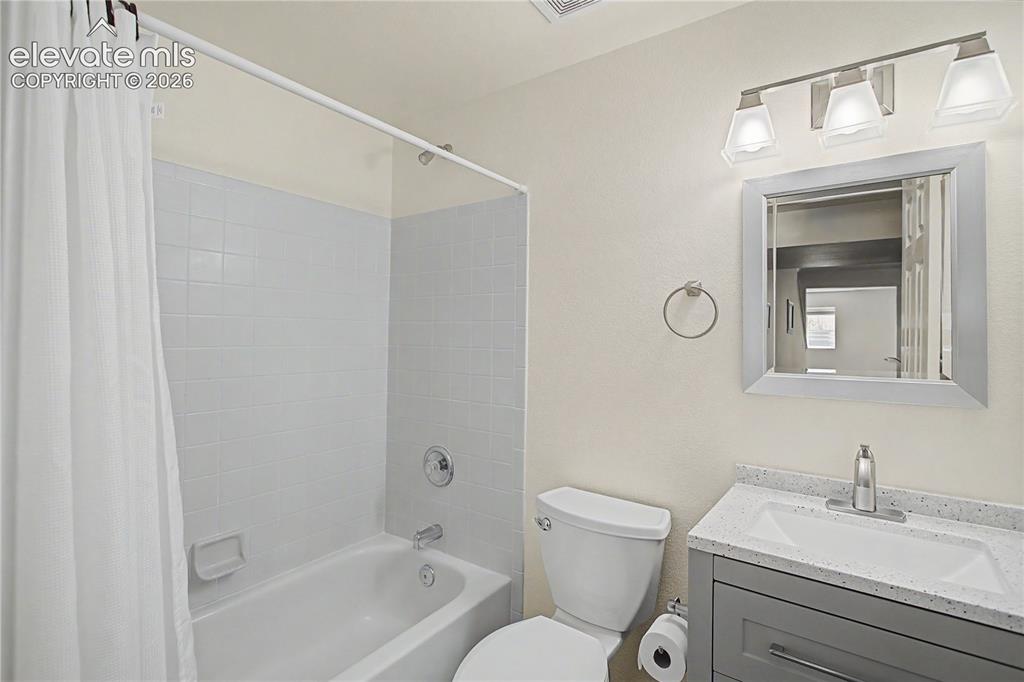 Image 26 of 40: Full bath in basement