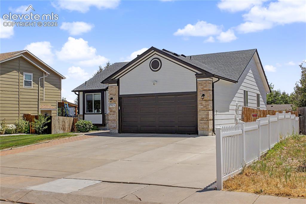 Image 3 of 40: Front view and RV parking area