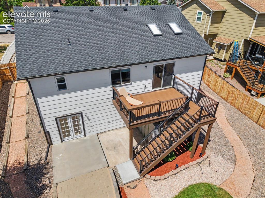 Image 34 of 40: Aerial view of backyard