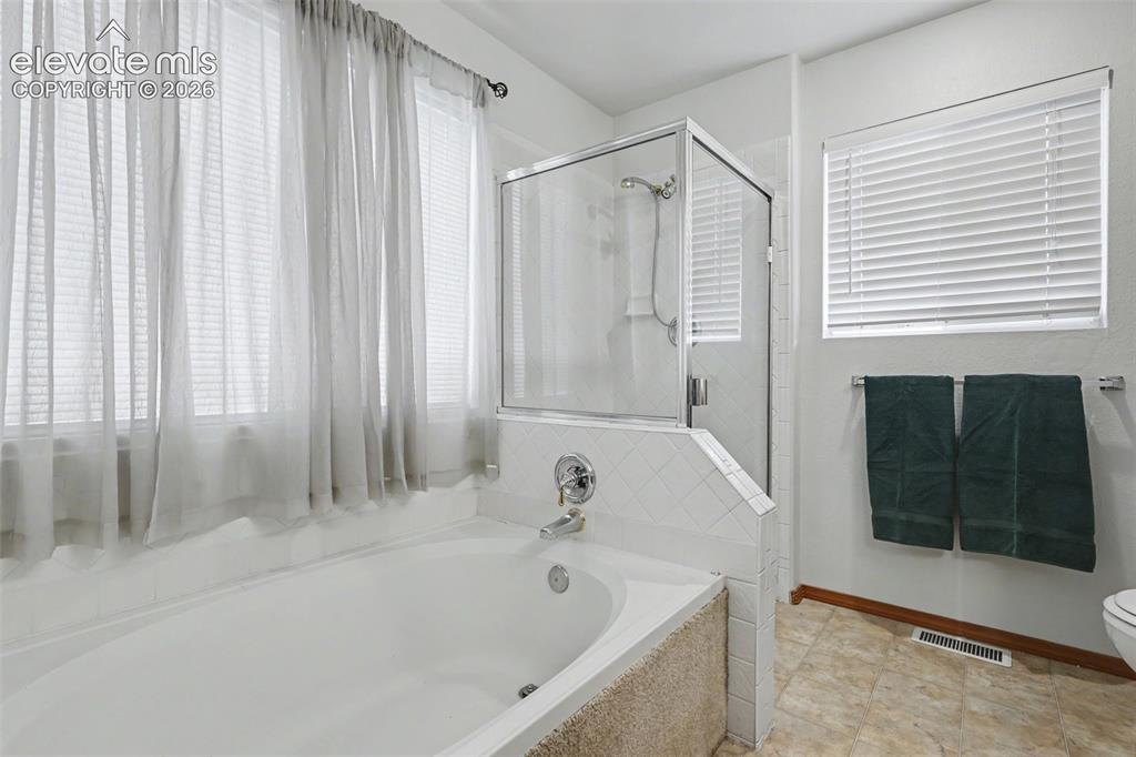 Image 16 of 31: Master Bedroom