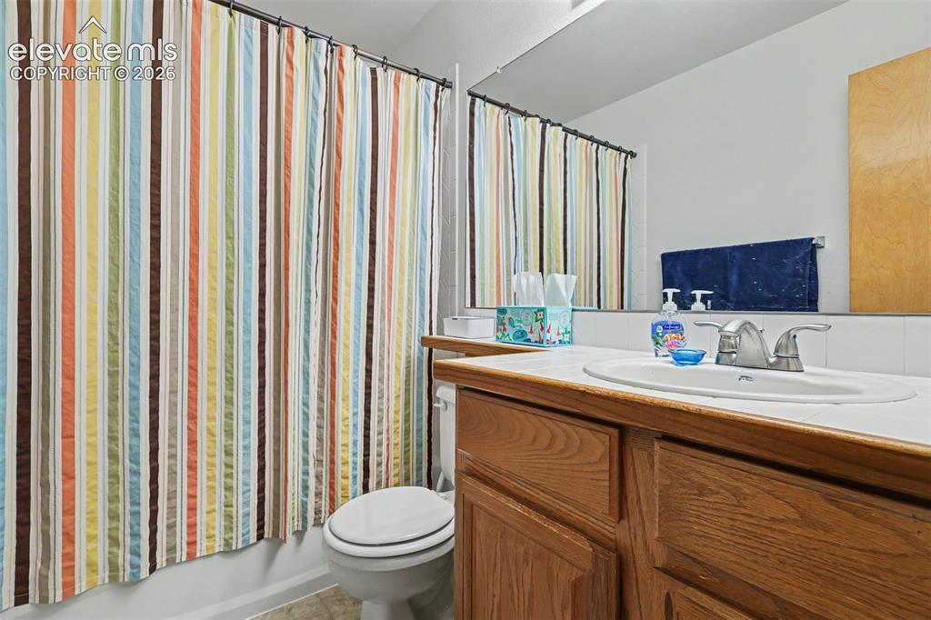 Image 18 of 31: Main level, hall bath