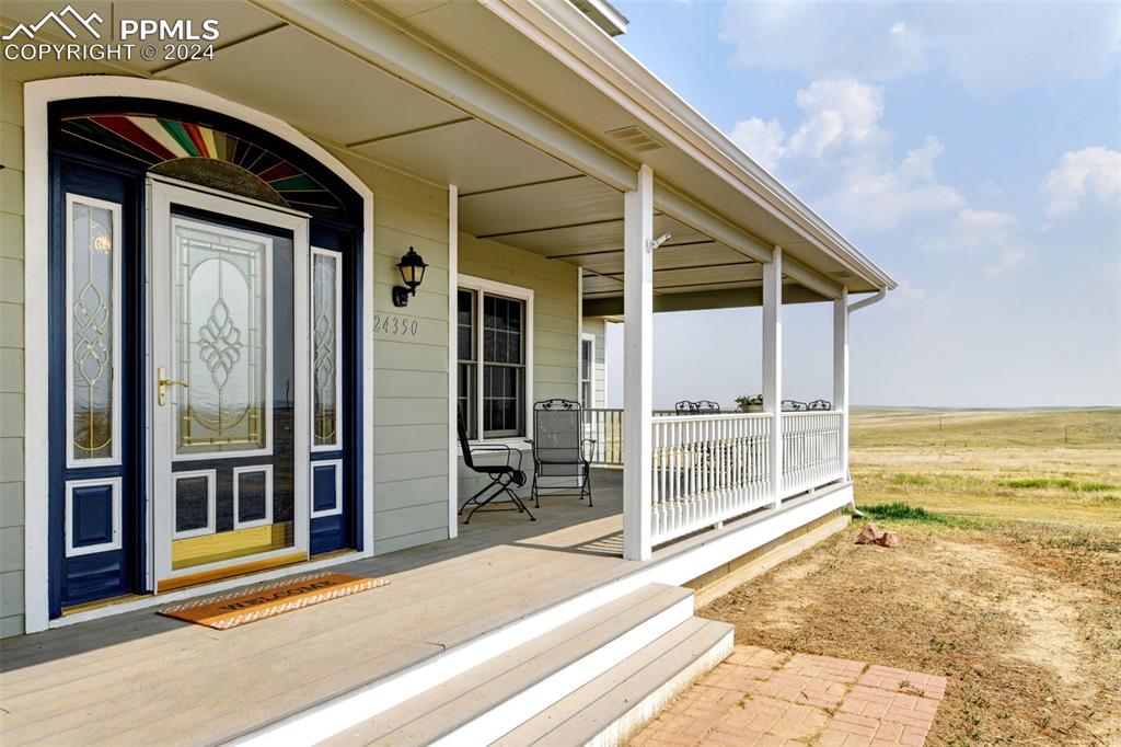 Image 2 of 45: Main Entry w covered deck