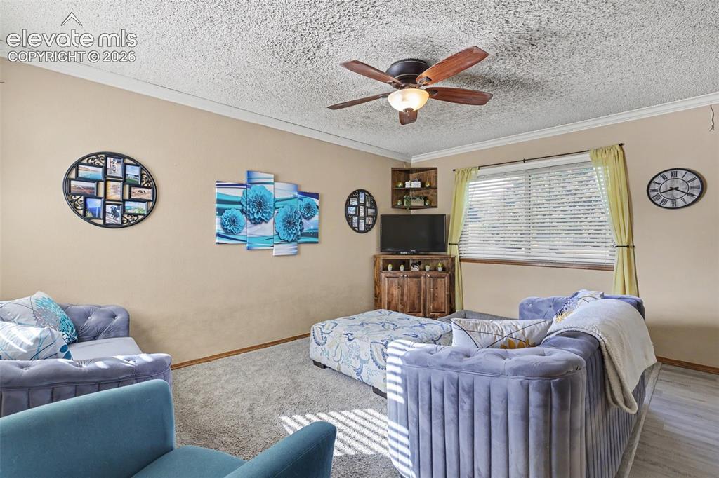 Image 12 of 34: Upper-level living room