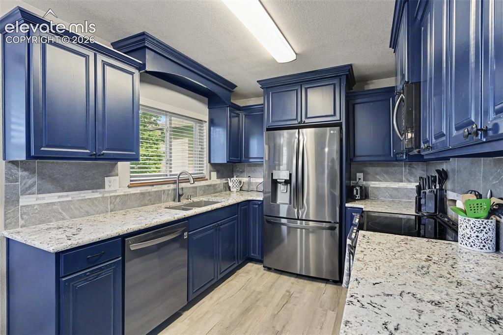 Image 2 of 34: Beautifully remodeled kitchen!