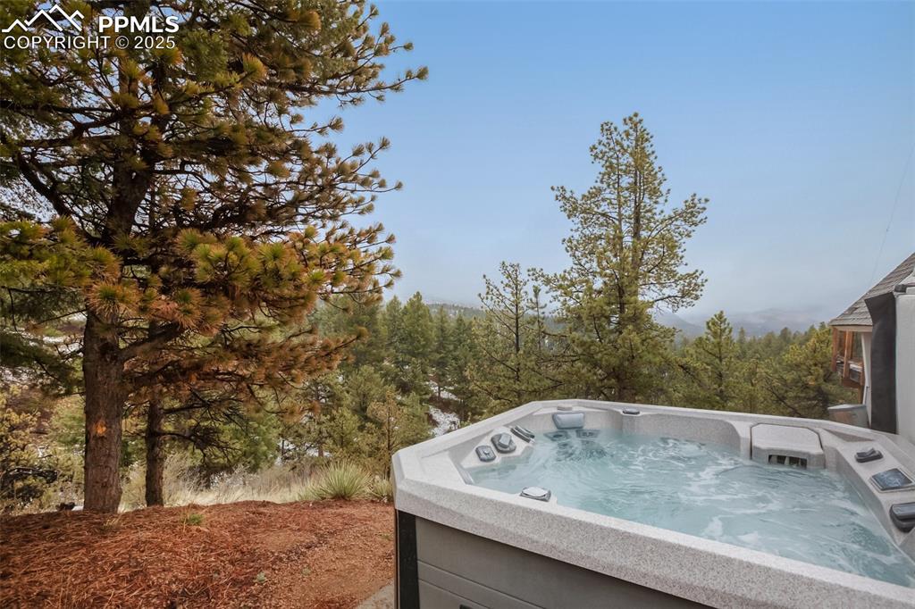 Image 7 of 50: Hot tub for soaking and stargazing!