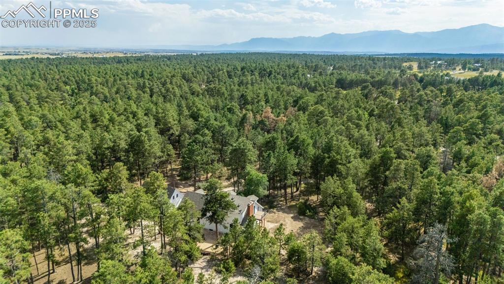 Image 42 of 43: Drone / aerial view of a mountainous background