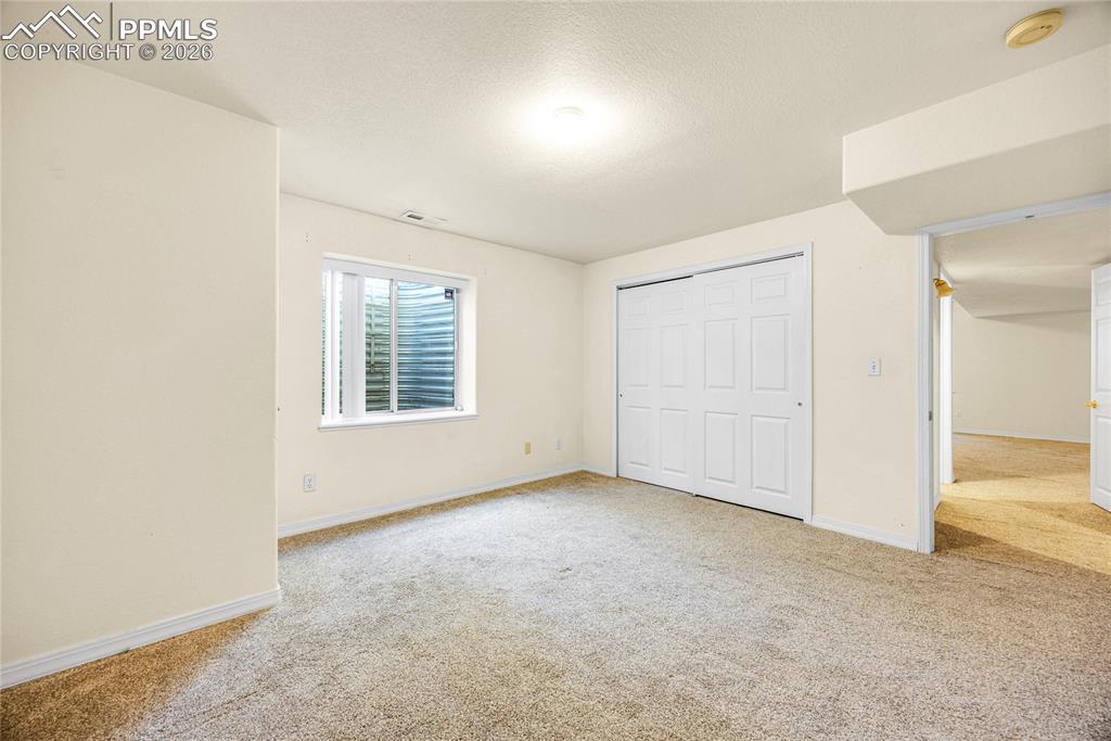 Image 27 of 34: Bedroom