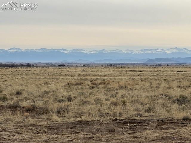 Image 12 of 28: Property view of mountains