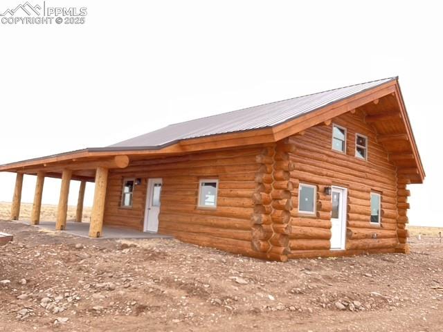 Image 3 of 28: Front & side of home