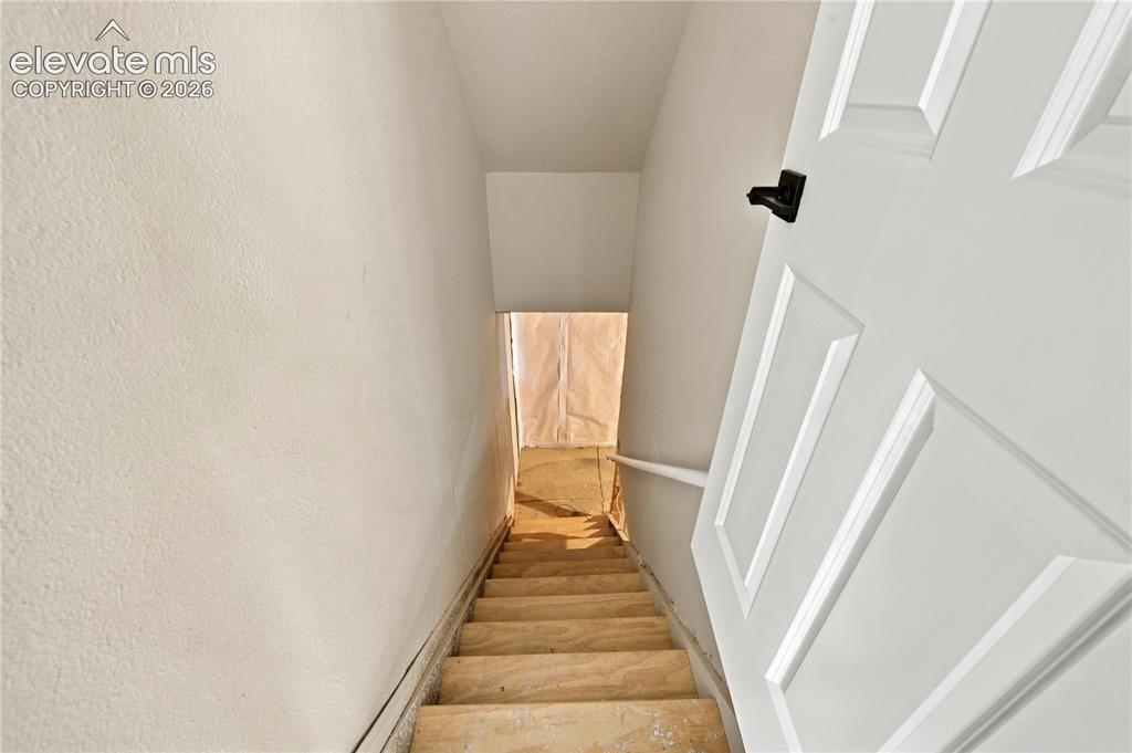 Image 18 of 35: Stairs to basement