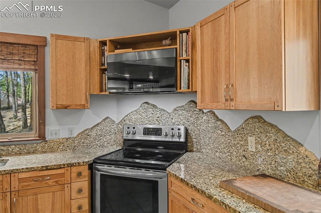 Image 18 of 50: Gorgeous custom backsplash design