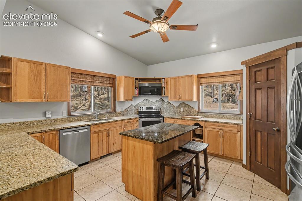 Image 18 of 50: With 2 pantry spaces!