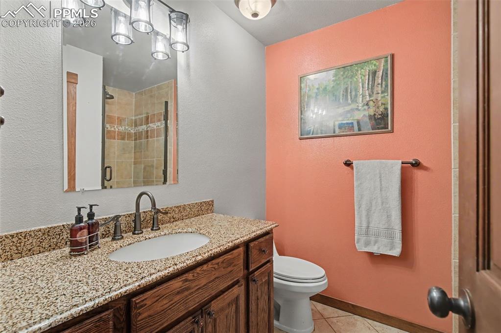 Image 24 of 50: Main level bath