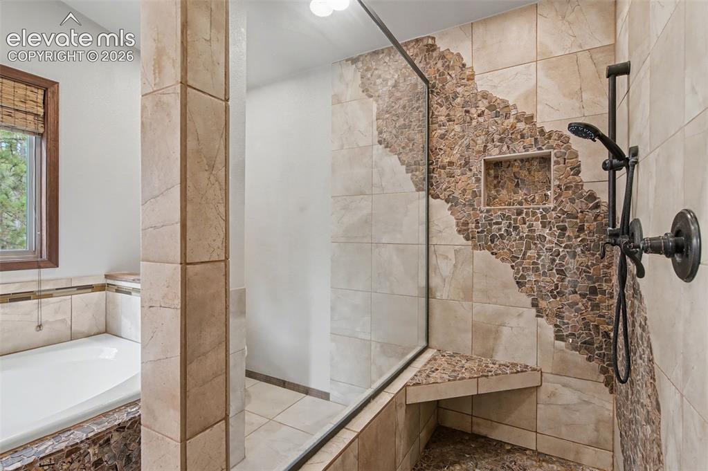 Image 30 of 50: With custom wood and stone features!