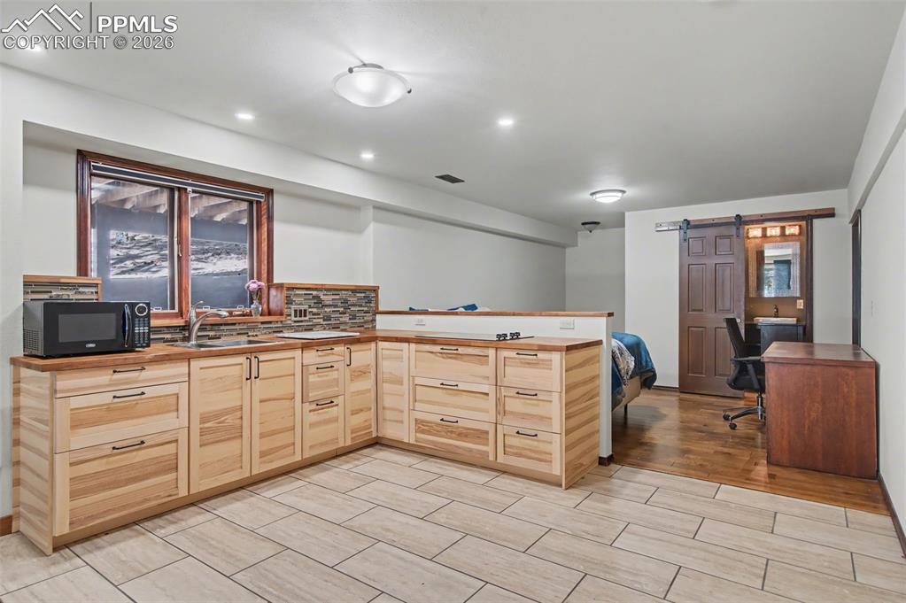 Image 38 of 50: Secondary Suite kitchen